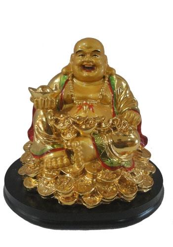 Buda de abundancia sentado con monedas, dojo zen buenos aires